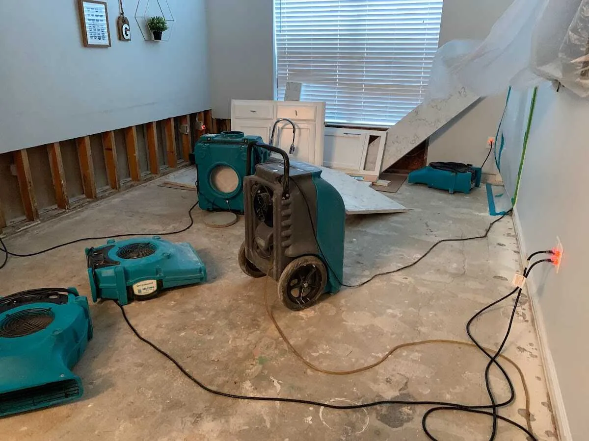Dehumidifier in flood-cut room for Water Damage Restoration in Lockhart